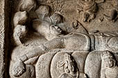 Mamallapuram - Tamil Nadu. the Mahishamardhini cave. The panel of Vishnu recumbent on serpent coils